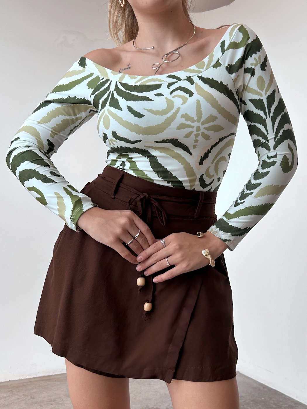 07 body feminino canoa e malha estampada nina