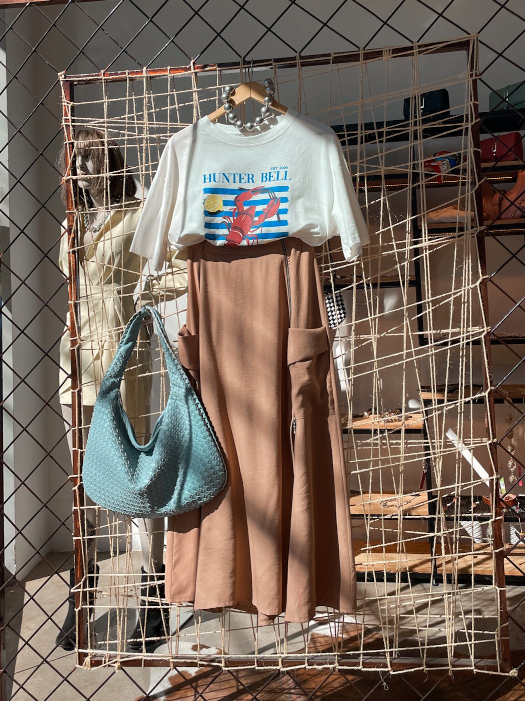 06 saia feminina midi com bolso utilitario com ziper tratorado na lateral vick